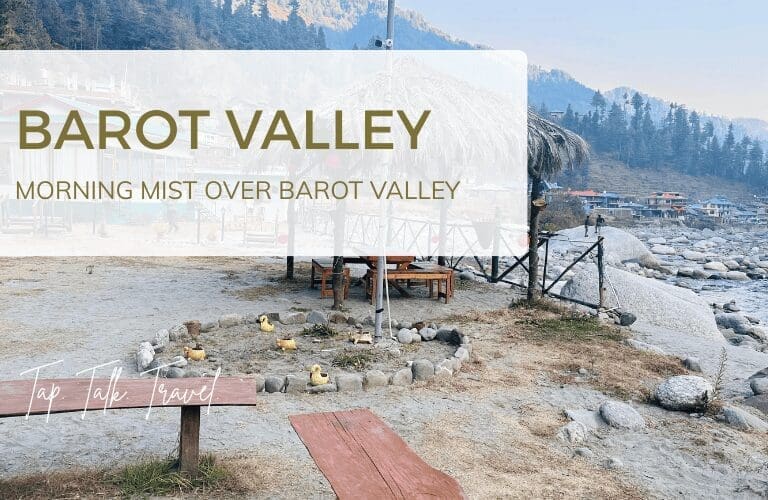 Peaceful morning view over Barot Valley with river and pine-covered hills for Barot Valley solo travelers